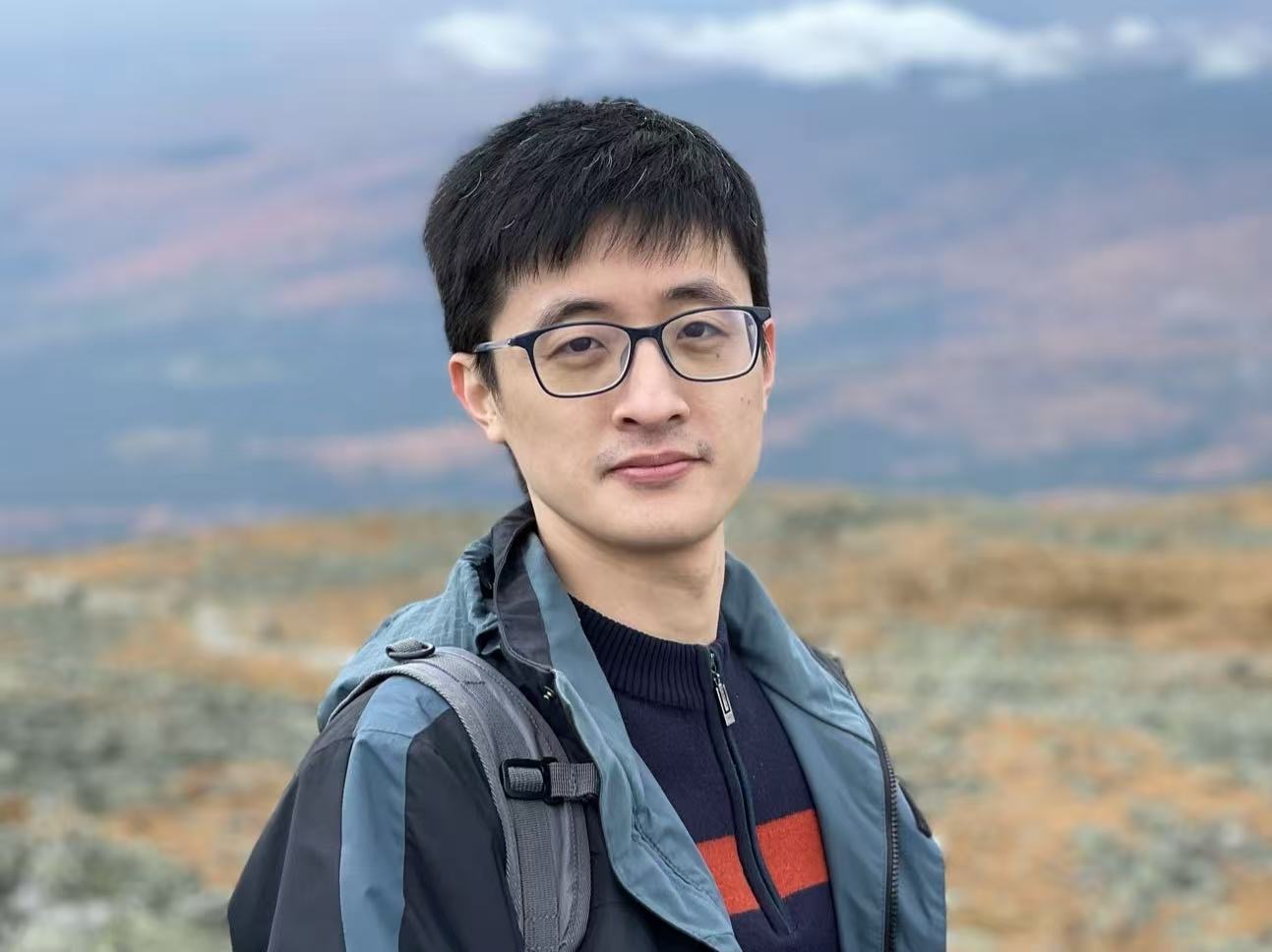 Organizing Committee Member 3